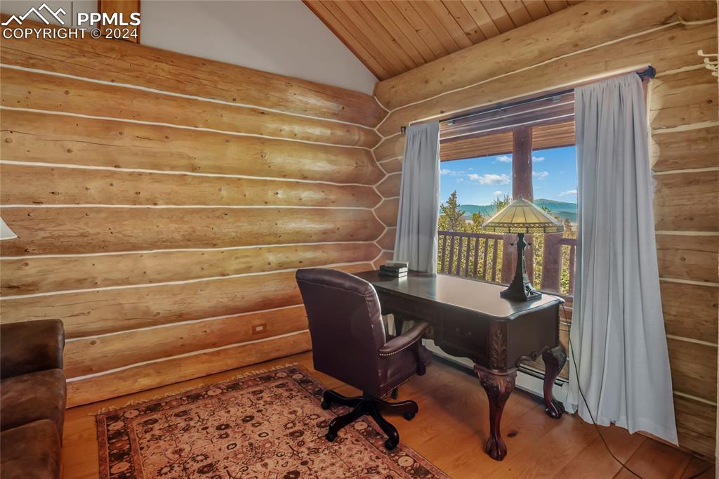616 Summit Road Hartsel, CO 80449 - Photo 35 of 50 a view of a workspace with furniture and a window