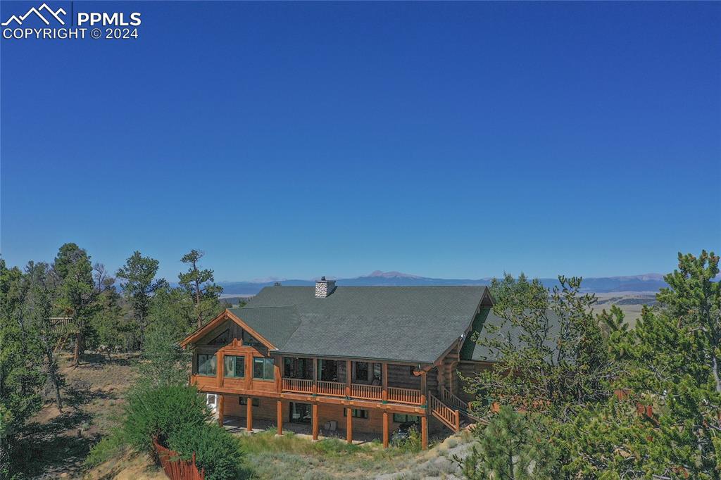 616 Summit Road Hartsel, CO 80449 - Photo 4 of 50 a aerial view of a house with a yard