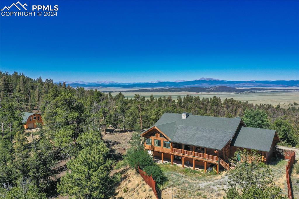 616 Summit Road Hartsel, CO 80449 - Photo 41 of 50 an aerial view of a house with a yard swimming pool and outdoor seating