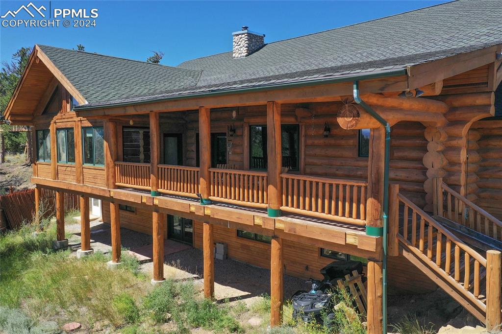 616 Summit Road Hartsel, CO 80449 - Photo 5 of 50 a view of a house with a window and wooden fence