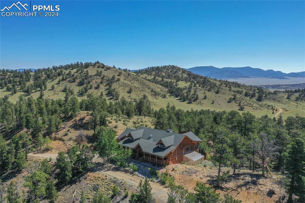 616 Summit Road Hartsel, CO 80449 - Photo 8 of 50 an aerial view of a house with mountain view