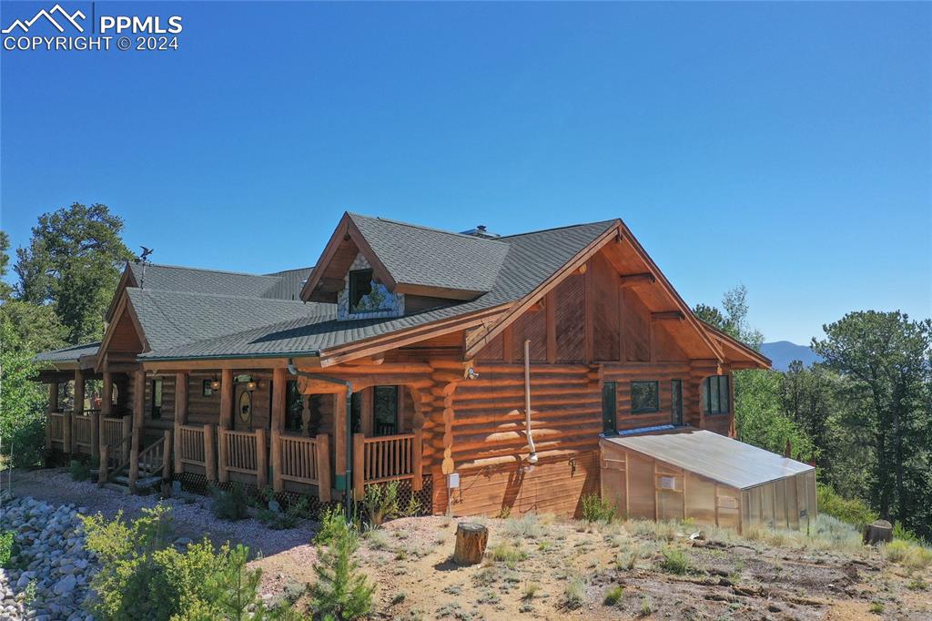 616 Summit Road Hartsel, CO 80449 - Photo 9 of 50 a view of a house with wooden fence
