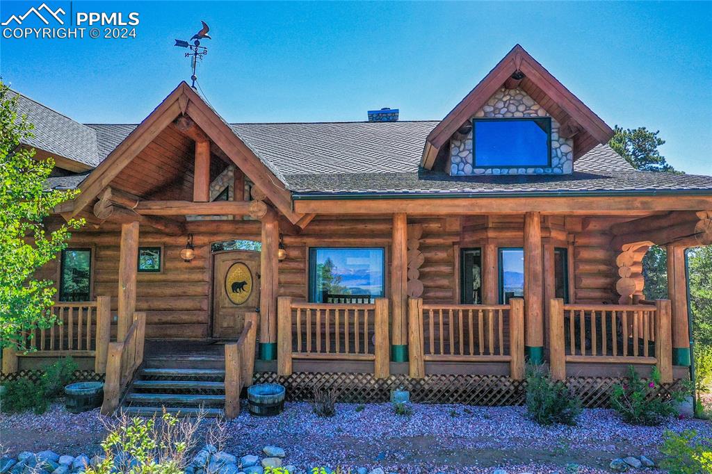 616 Summit Road Hartsel, CO 80449 - Photo 10 of 50 front view of a house with a small yard