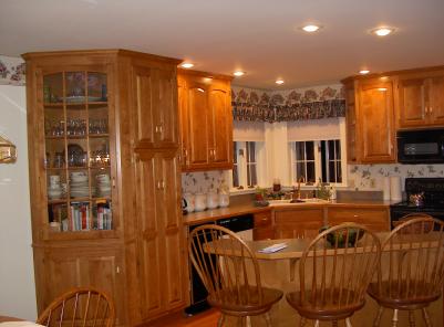 128 Cherry Hill Road Nazareth, PA 18064 - Photo 3 of 8 Kitchen with island bar, 42' birch cabinets and pantry with glass front door