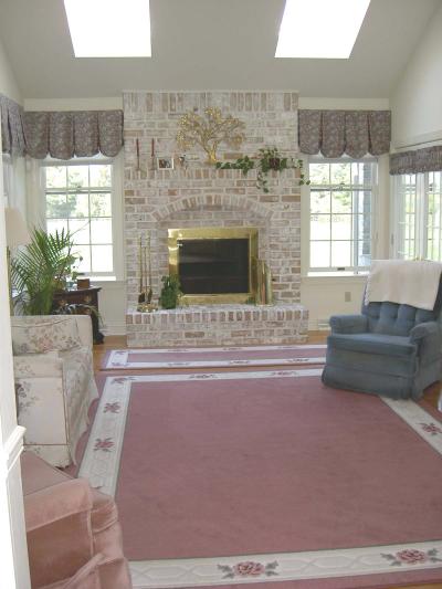 128 Cherry Hill Road Nazareth, PA 18064 - Photo 6 of 8 Family Room with brick fireplace, hardwood floors, skylights and French doors to Sun Room