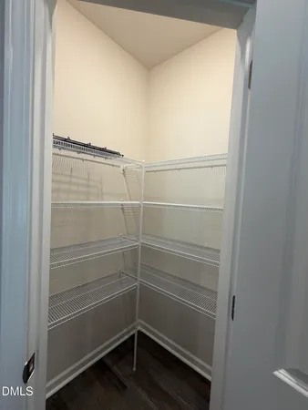 a empty closet with white paint