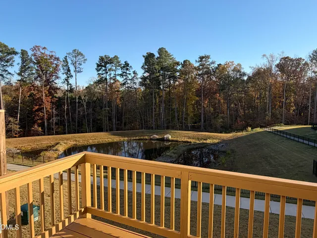 a view of a wooden fence