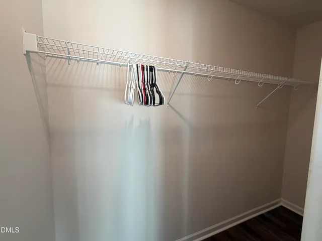 a view of a room with racks on the wall