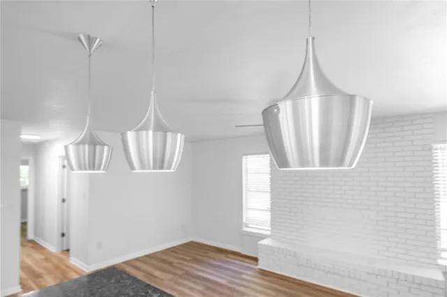 a view of entryway with wooden floor