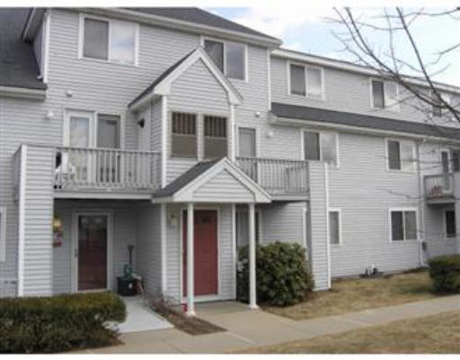 360 Littleton Road, Unit A11 Chelmsford, MA 01824 - Photo 1 of 8 a front view of a house with garden