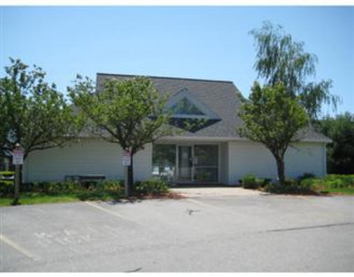 360 Littleton Road, Unit A11 Chelmsford, MA 01824 - Photo 8 of 8 front view of a house with a yard