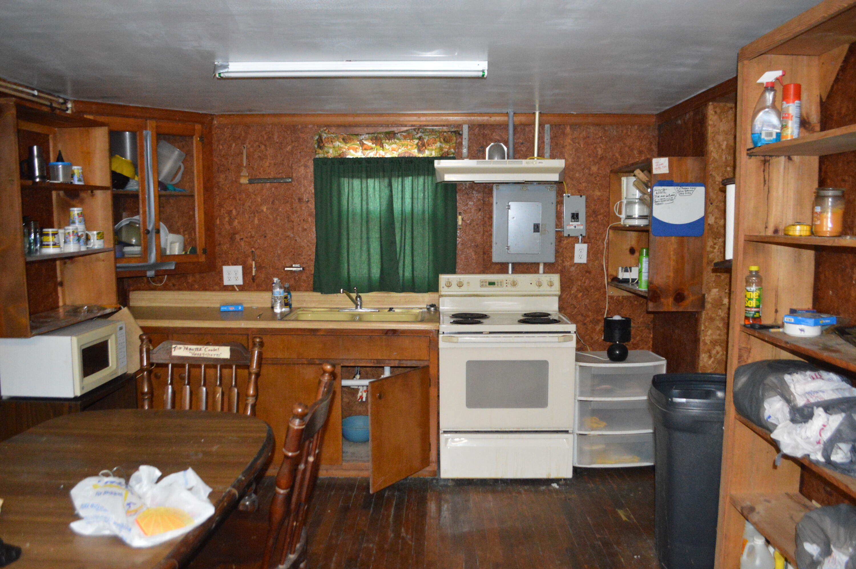 4140 Peaceful Valley Road New Castle, VA 24127 - Photo 6 of 14 a kitchen with stainless steel appliances granite countertop a stove a sink and a refrigerator