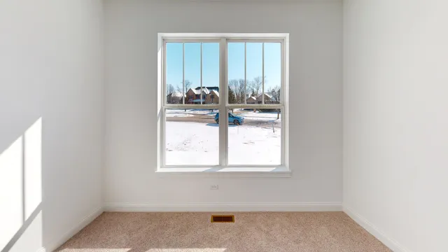 an empty room with window