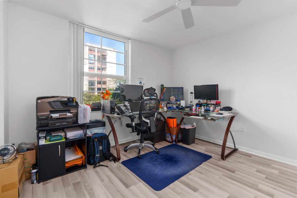 520 Southeast 5th Avenue, Unit 2209 Fort Lauderdale, FL 33301 - Photo 13 of 47 a view of a workspace with furniture and a window