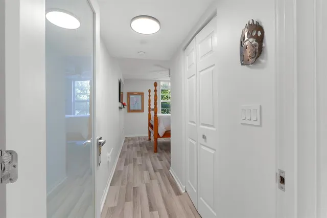 a view of entryway with wooden floor