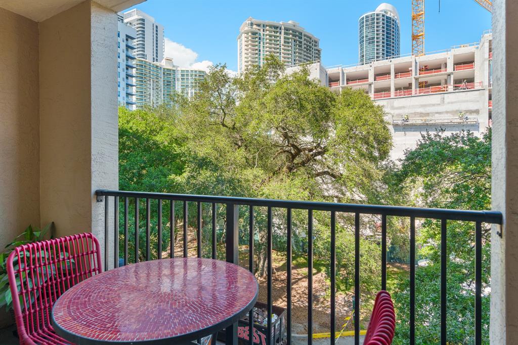 520 Southeast 5th Avenue, Unit 2209 Fort Lauderdale, FL 33301 - Photo 24 of 47 a view of a balcony with furniture