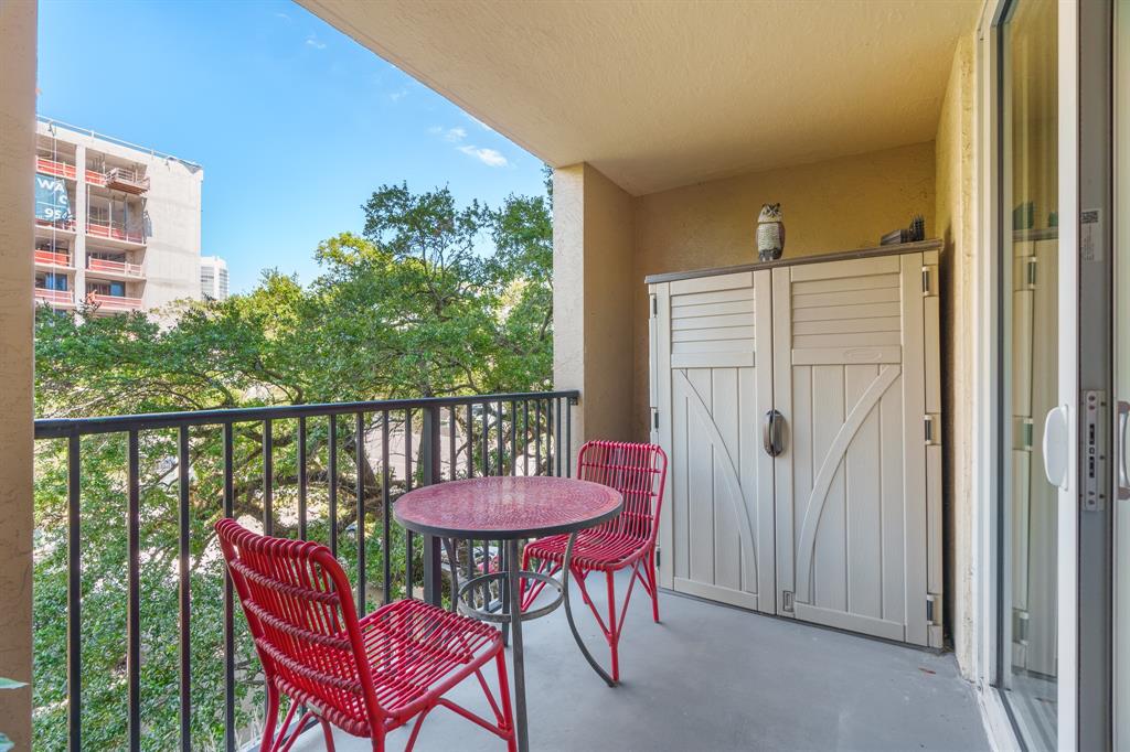 520 Southeast 5th Avenue, Unit 2209 Fort Lauderdale, FL 33301 - Photo 25 of 47 a view of a balcony with a table and chairs