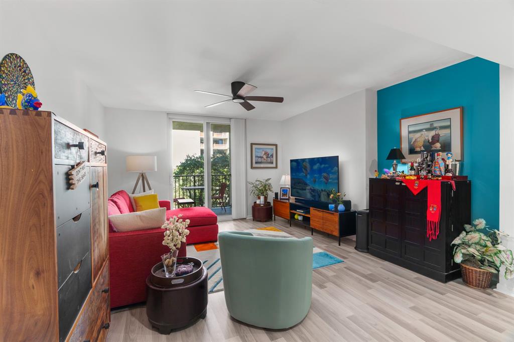 520 Southeast 5th Avenue, Unit 2209 Fort Lauderdale, FL 33301 - Photo 3 of 47 a living room with furniture fireplace and a window