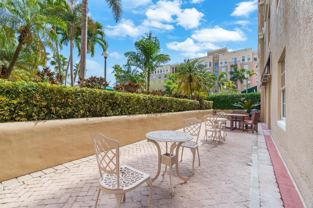 520 Southeast 5th Avenue, Unit 2209 Fort Lauderdale, FL 33301 - Photo 42 of 47 a view of a patio with a table and chairs and potted plants