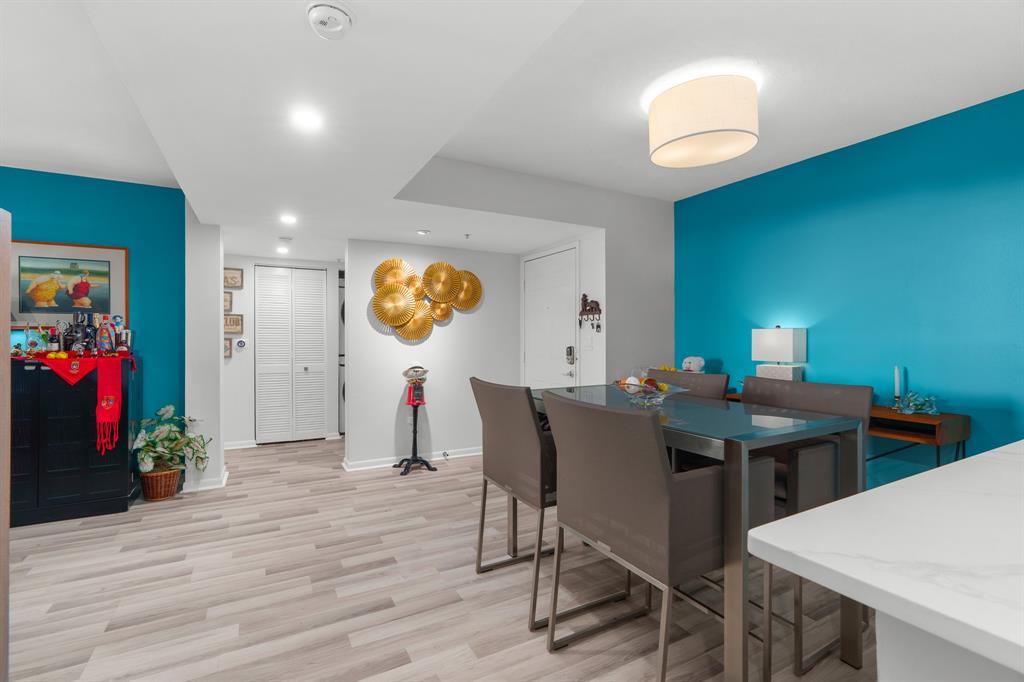 520 Southeast 5th Avenue, Unit 2209 Fort Lauderdale, FL 33301 - Photo 5 of 47 a view of a dining room with furniture and wooden floor