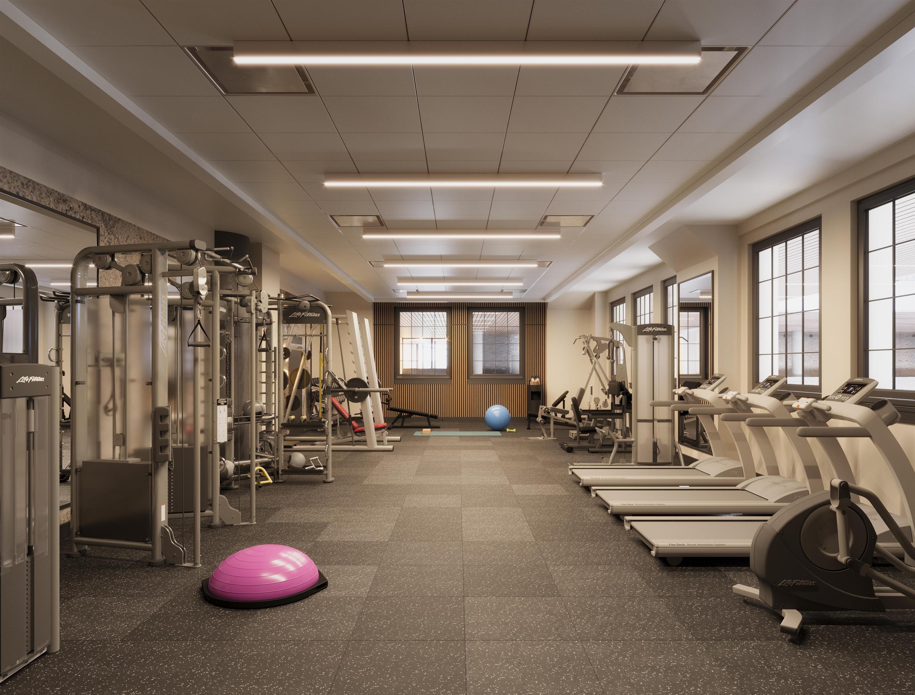 38 Jackson Street, Unit PH3 Hoboken, NJ 07030 - Photo 9 of 15 a view of a room with gym equipment
