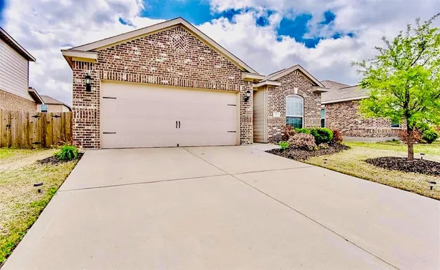 a view of a house with a street
