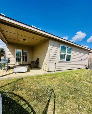 a view of a house with a patio