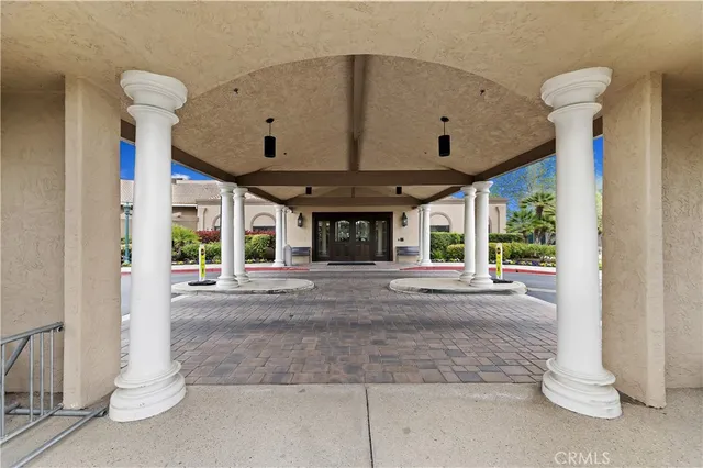 a room with furniture and pool tables