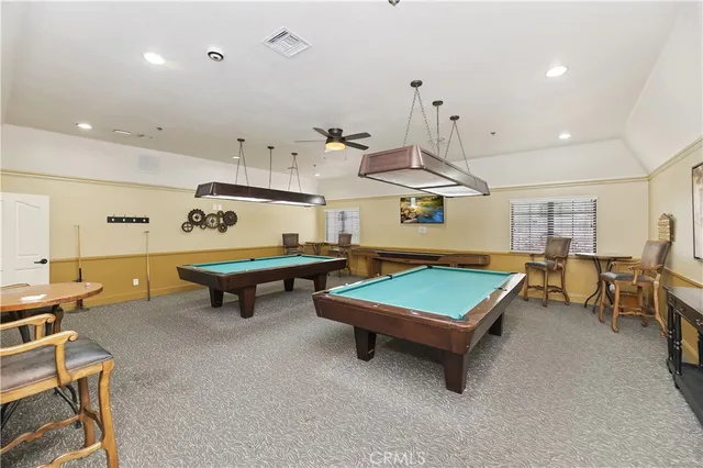 a view of swimming pool from a balcony