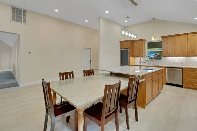a view of a dining room with furniture