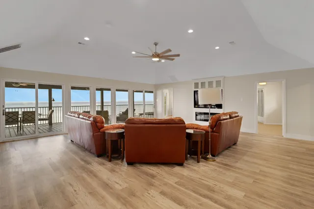 a view of kitchen with stainless steel appliances granite countertop lots of counter top space