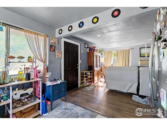 a bathroom with a sink vanity mirror and tub