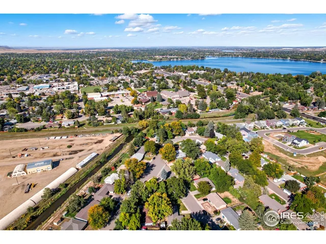 a view of a house with a flower garden