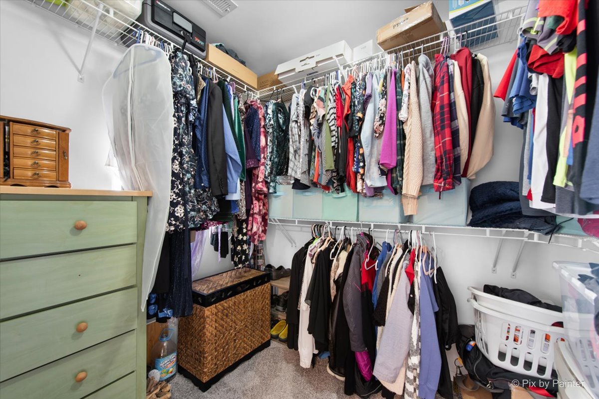 1033 Key Largo Drive Romeoville, IL 60446 - Photo 17 of 30 a view of walk in closet with clothes