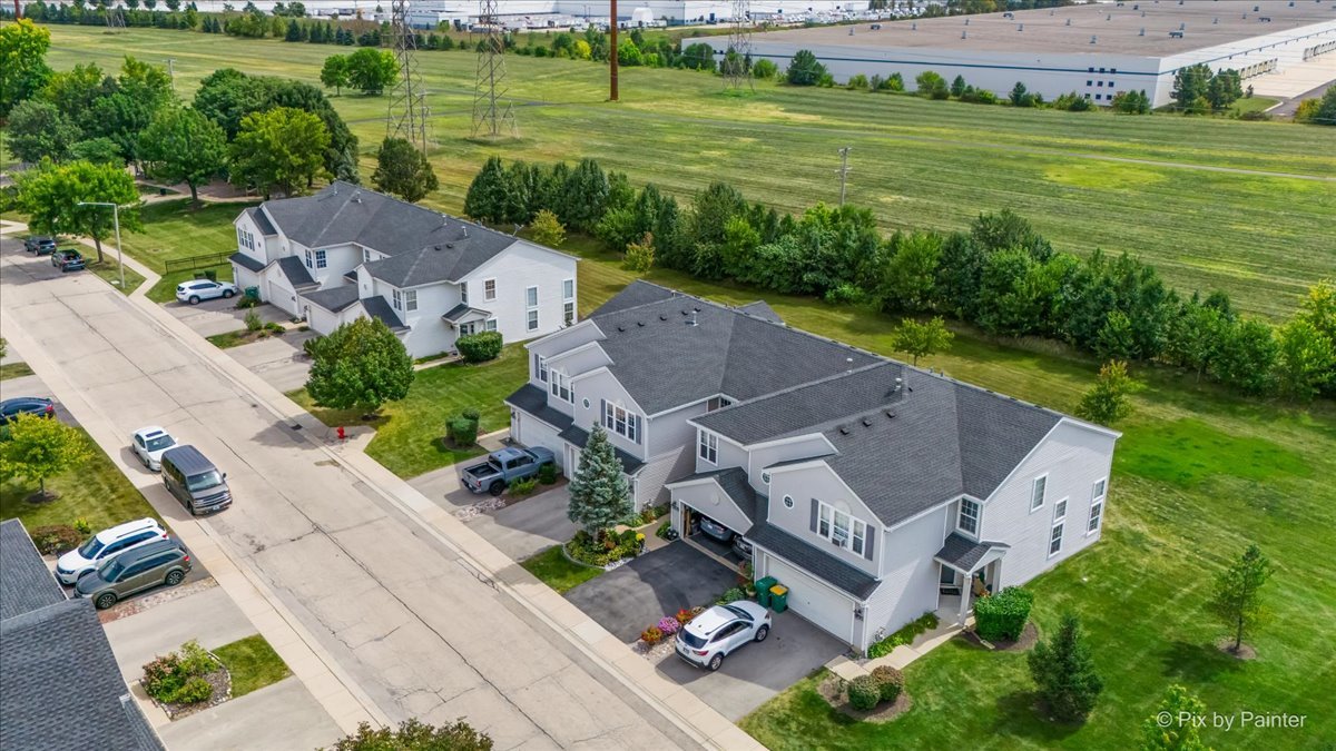 1033 Key Largo Drive Romeoville, IL 60446 - Photo 23 of 30 an aerial view of a house with a garden