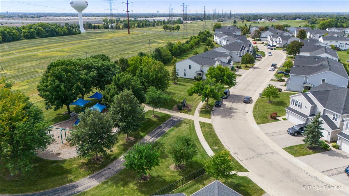 1033 Key Largo Drive Romeoville, IL 60446 - Photo 25 of 30 an aerial view of a residential houses with outdoor space and street view