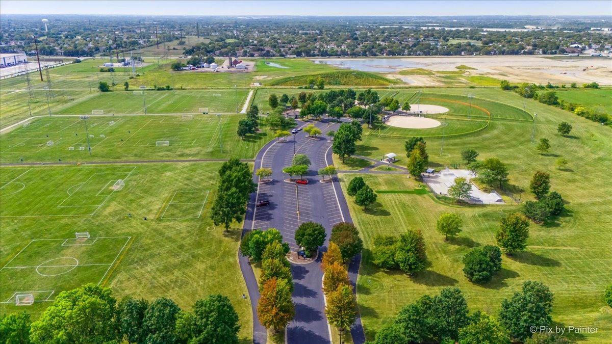 1033 Key Largo Drive Romeoville, IL 60446 - Photo 26 of 30 an aerial view of a house with a garden and mountain view