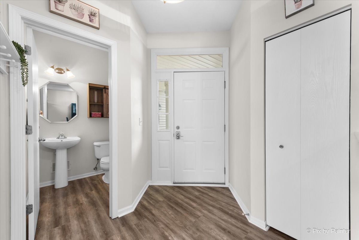 1033 Key Largo Drive Romeoville, IL 60446 - Photo 3 of 30 a view of a bathroom from a hallway
