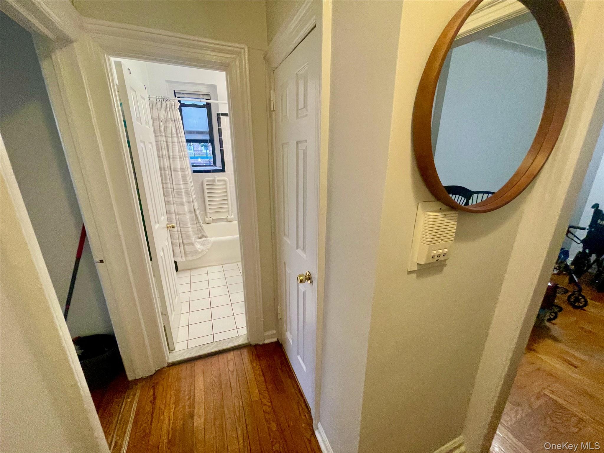 62-64 Saunders Street, Unit 1A Queens, NY 11374 - Photo 11 of 20 an entryway with wooden floor and entryway