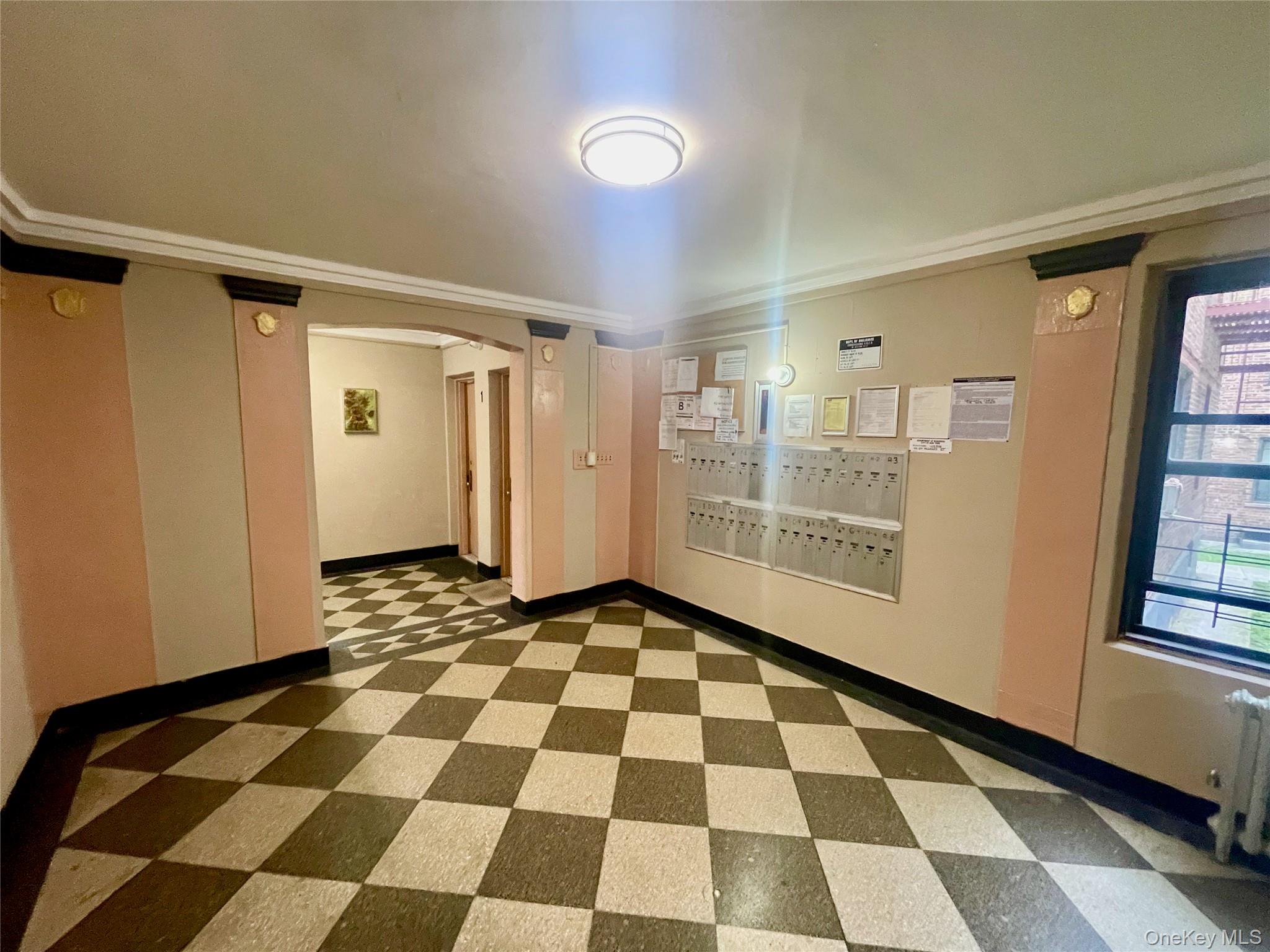 62-64 Saunders Street, Unit 1A Queens, NY 11374 - Photo 17 of 20 a view of a black and white checkered floor in a room