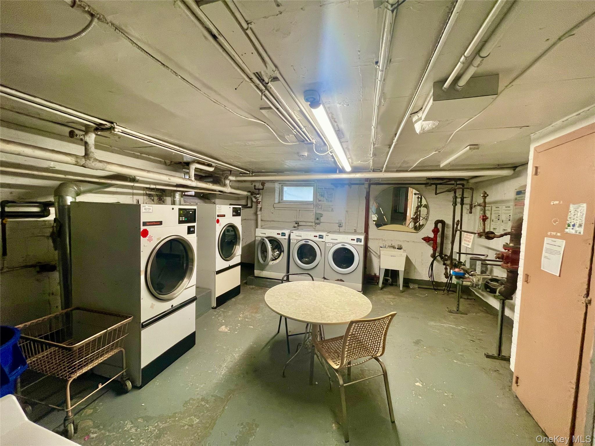62-64 Saunders Street, Unit 1A Queens, NY 11374 - Photo 19 of 20 a utility room with dryer and washer