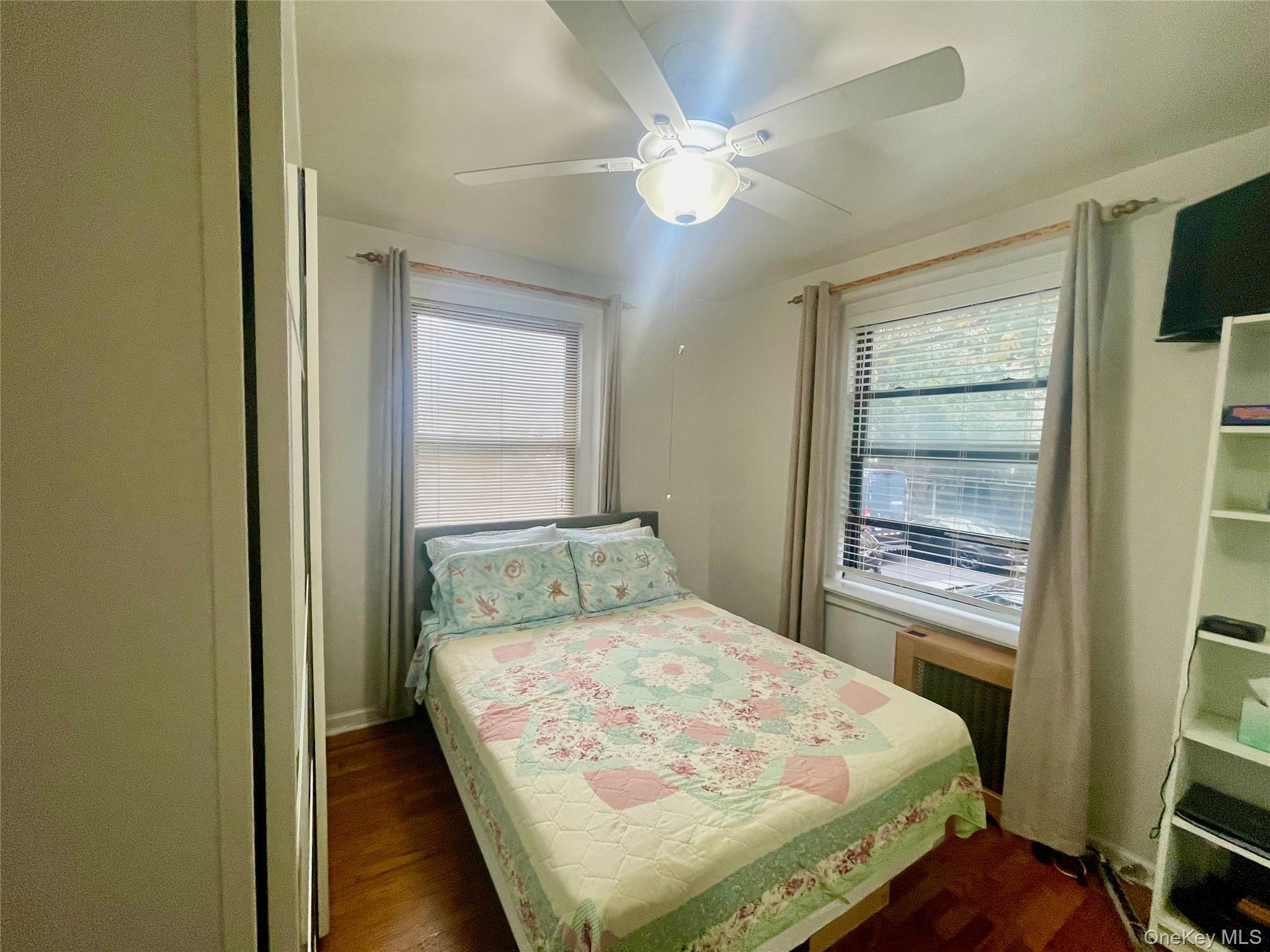 62-64 Saunders Street, Unit 1A Queens, NY 11374 - Photo 5 of 20 a bedroom with a bed and a window