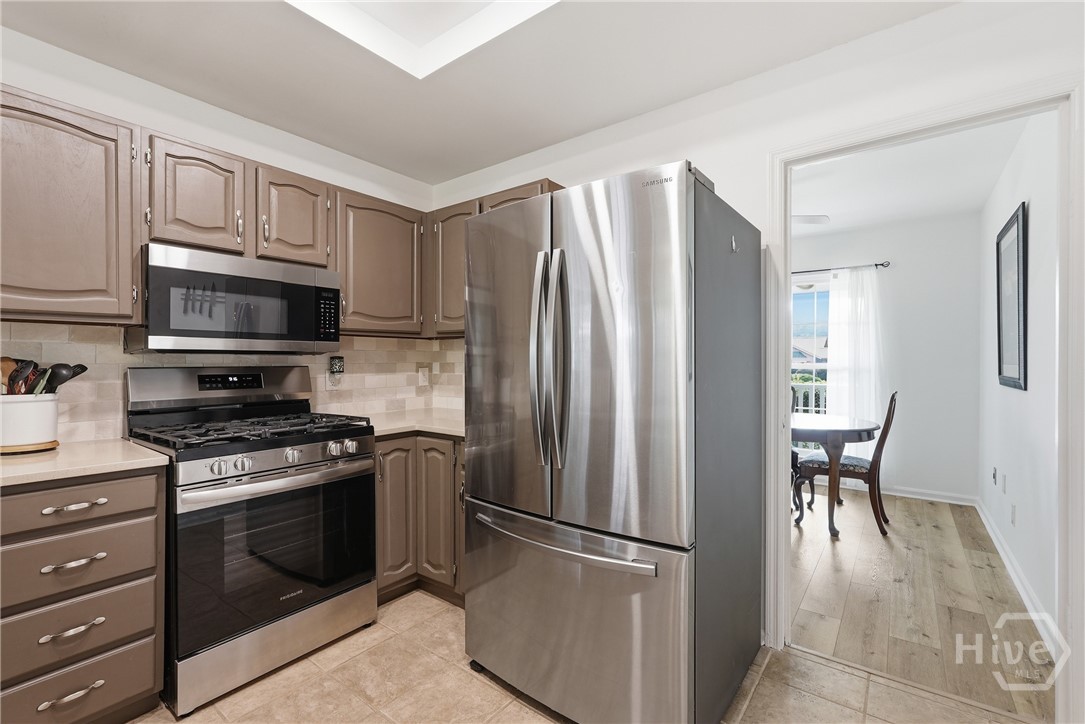 3 Rice Mill Drive Savannah, GA 31419 - Photo 9 of 37 Updated kitchen is bright and open.