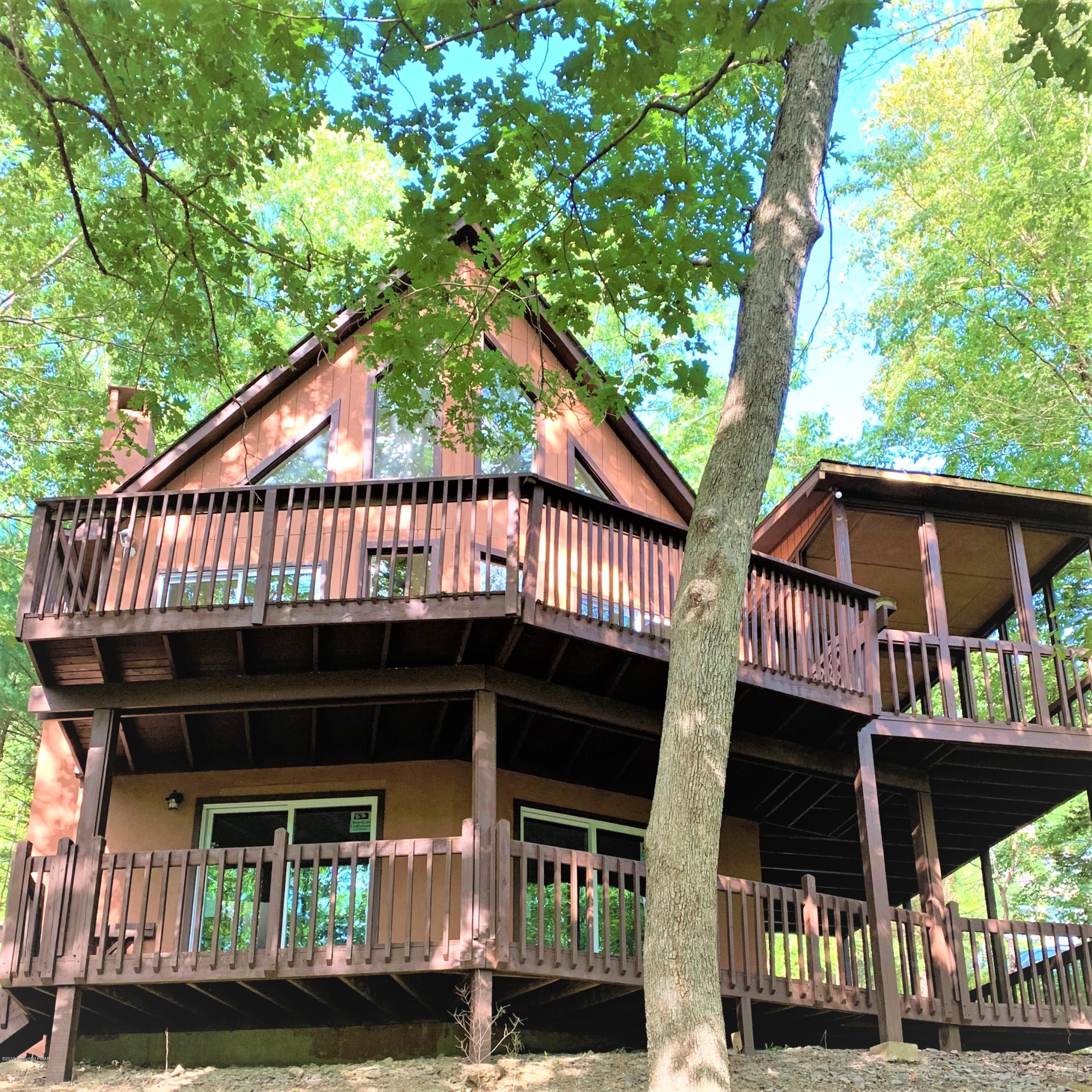 125 Edinburgh Road Bushkill, PA 18324 - Photo 1 of 19 a front view of a house with balcony