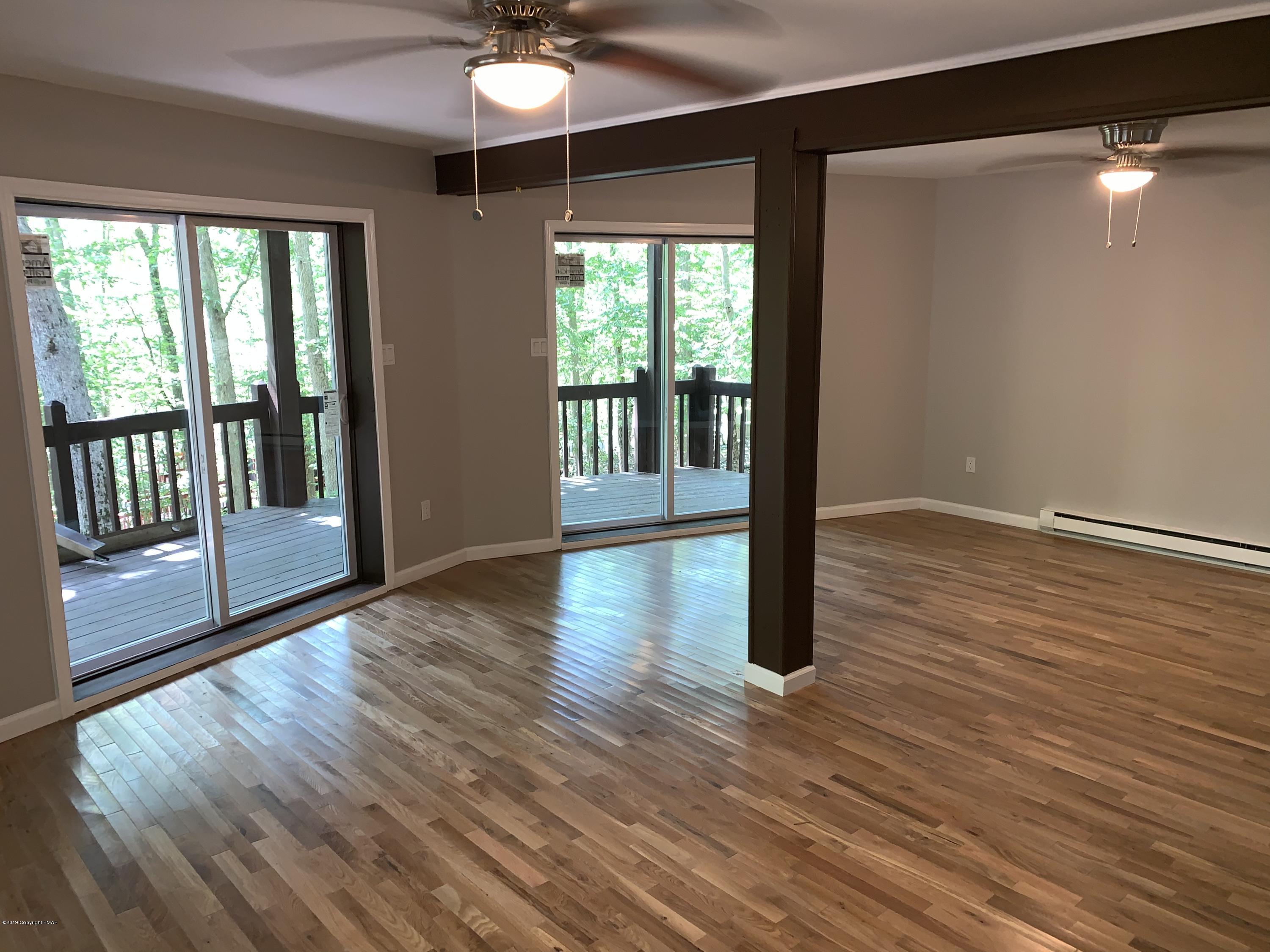 125 Edinburgh Road Bushkill, PA 18324 - Photo 15 of 19 wooden floor in an empty room with a window