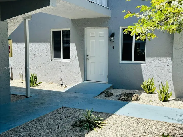 a vase of flowers sitting on a table