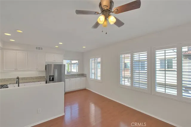 a view of a hallway with washer and dryer