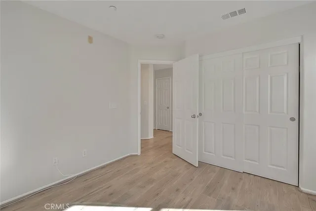 a view of a chair and tables back yard of the house