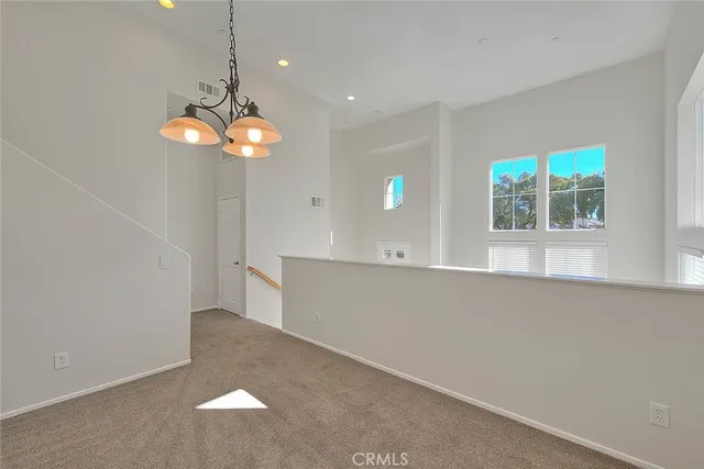 a kitchen with stainless steel appliances granite countertop a refrigerator sink and cabinets