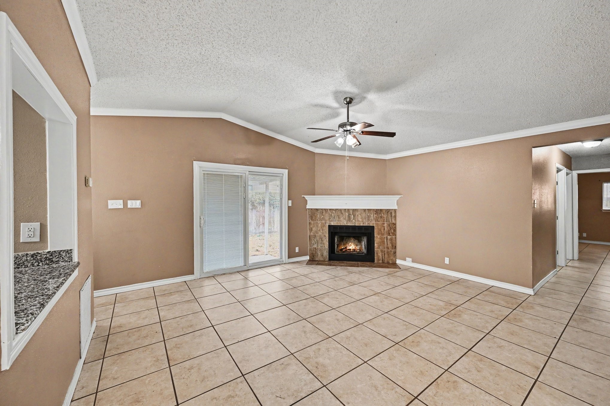 8406 Forest Ridge Drive San Antonio, TX 78239 - Photo 6 of 33 a view of an empty room with a chandelier fan